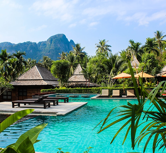 Tropical resort with mountains and pool